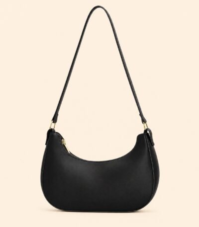 Black crescent leather luxury shoulder bag for women with elegant curved design and shoulder strap